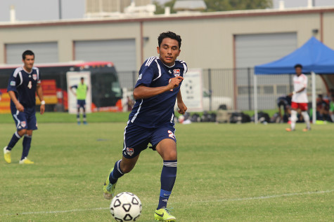 Defender Jose Alvalardo sprints down the field to catch a pass. The Hawks lost 3-1.