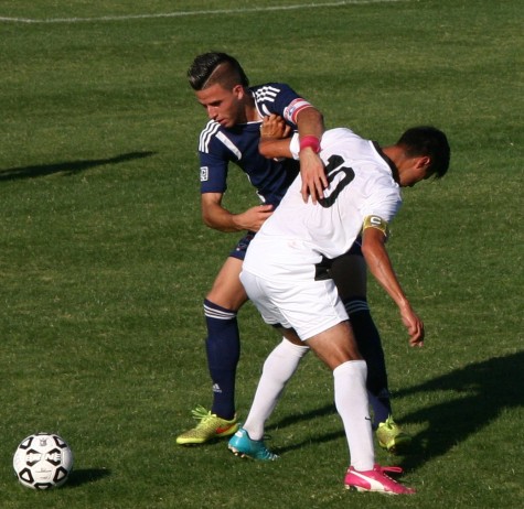 Defender Jose Torres fights for the ball on Oct.9 against Taft College