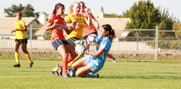Sophomore forward Melissa Gomez kicks the ball into Delta College sophomore goalkeeper Erikka Diarte in the first half. Freshman forward Katie Ulan found the rebound for the Hawks' only goal in their 1-0 win on Oct. 28. 