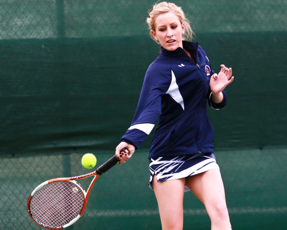 Sophomore tennis player Brianna Schmitgen forehands the ball against American River College in her singles match on March 17.