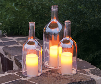 Home-made hurricane lamps on Pinterest that I pinned to my "things in jars" board. I don't know which would be more fun: enjoying their glow, making the lamps or drinking the wine.
