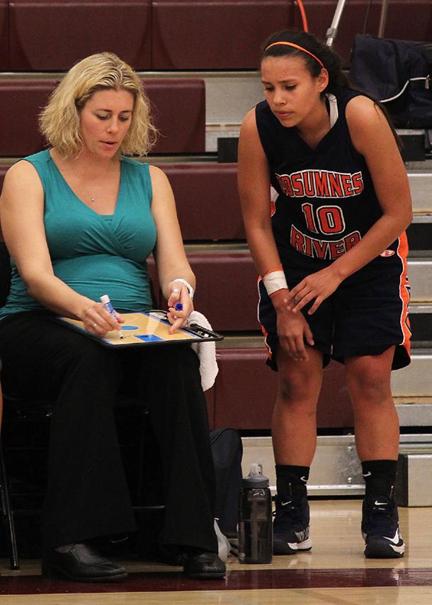 Hawks' coach sets example of dedication for team