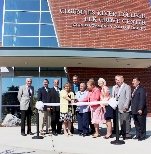 Surrounded by officials from the Los Rios Community College District and the city of Elk Grove, LRCCD Board of Trustees member Pamela Haynes cuts the ceremonial ribbon at Cosumnes River College's new Elk Grove Center on Sept. 13.