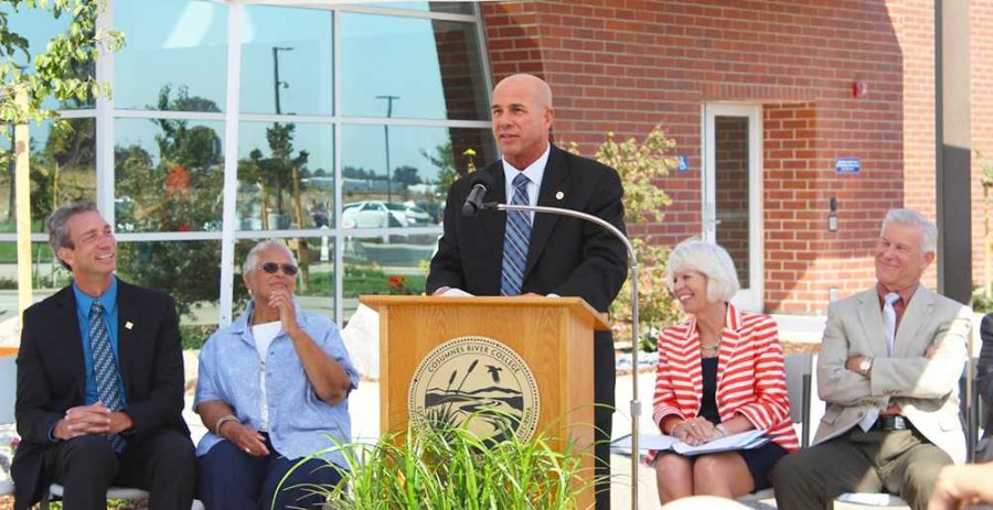 Flanked by other speakers, Elk Grove Vice Mayor Steve Detrick speaks of the center’s importance in the community. 