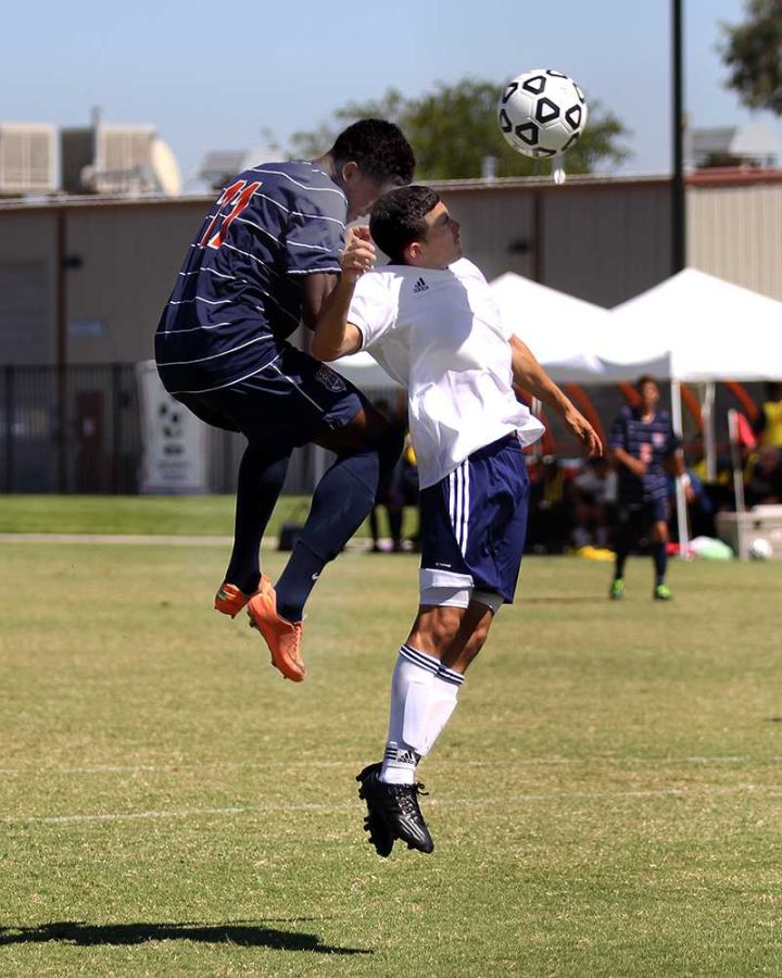 Cosumnes River College Hawks' sophomore forward Darrien Parker attempts to hit the ball into the goal in the game against Yuba City College on Sept. 8. While he was unsuccessful, the Hawks went on to score their first goal of the game moments later.