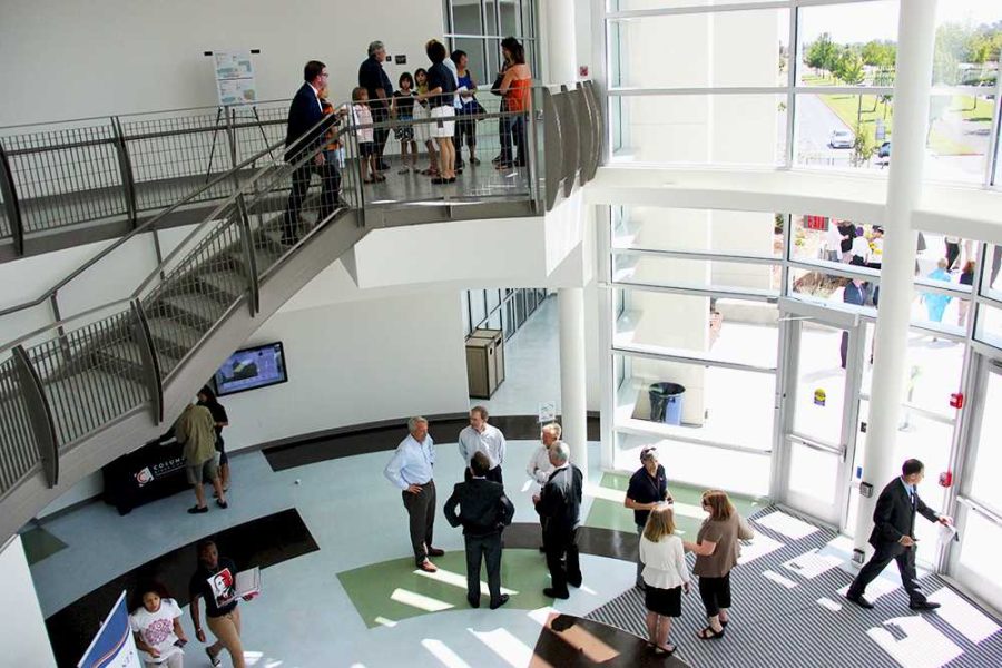 Faculty, Board of Trustee members, and various guests tour the newly opened Winn Center for Architecture and Construction after its official dedication on Aug. 23.