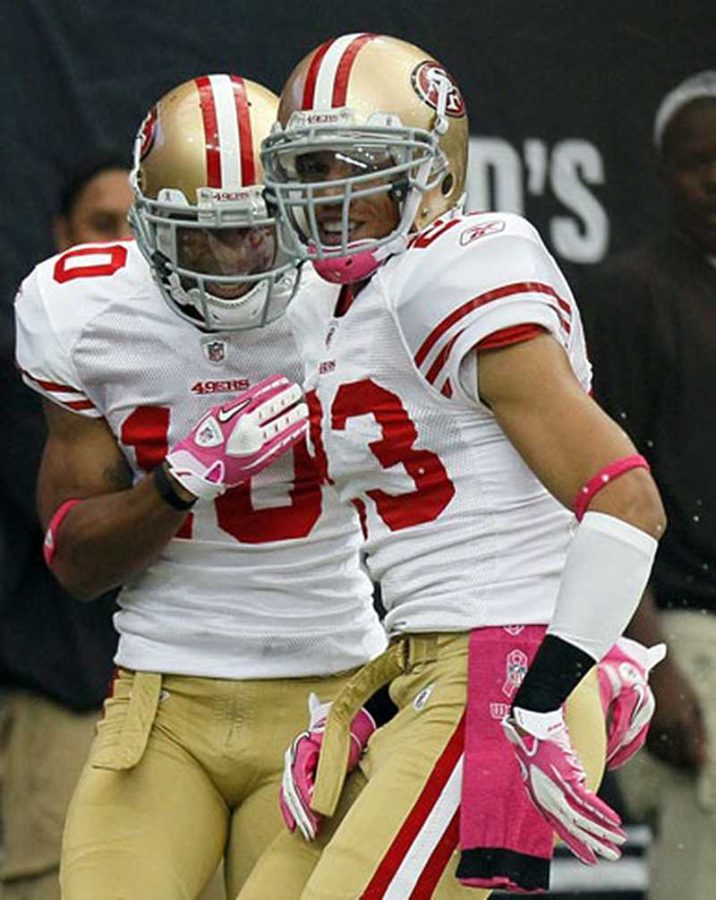 Members of the San Francisco 49ers sport pink attire in honor of Breast Cancer Awareness Month.