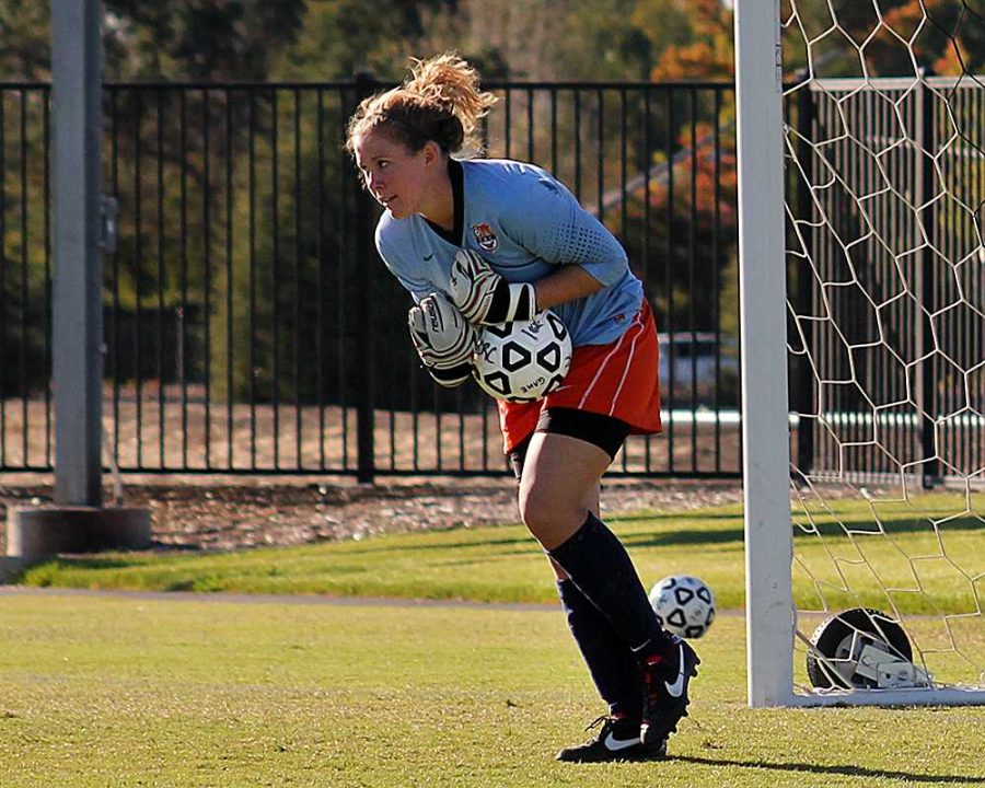 Hawks freshman goalkeeper Anna Brown saves a goal in Cosumnes River Colleges game against Modesto Junior College on Sept. 27. The Hawks won the game 3-0.