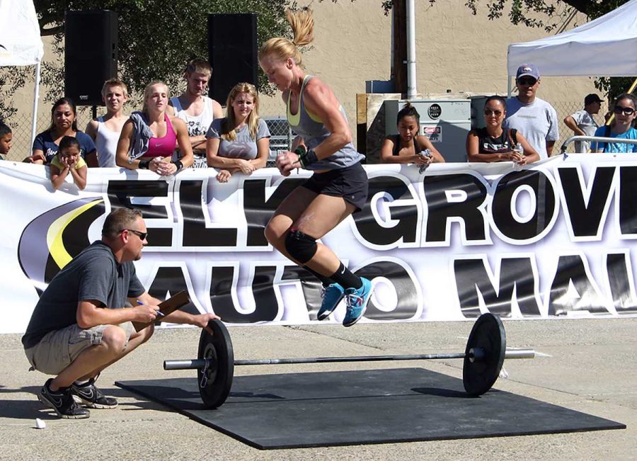 A competitor jumps over a bar in the finals of the competition. 