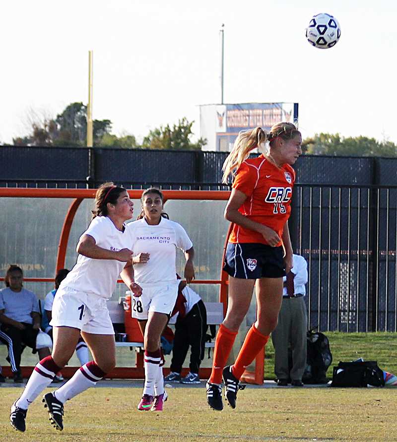 Freshman midfielder Kylie Forbes heads a ball in Cosumnes River Colleges game against Sacramento City College on Oct. 25.