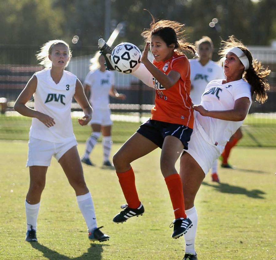 CRC freshman defender Selina Barbosa goes up for a header while being contended by Diablo Valley College freshman defender Desiree Mesa on Oct. 4. The Hawks and the Vikings were locked in a defensive struggle all game long.