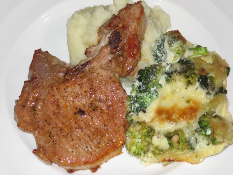 A well-prepared meal of pork chops, broccoli, and mashed potatoes that any college student can manage on a budget.