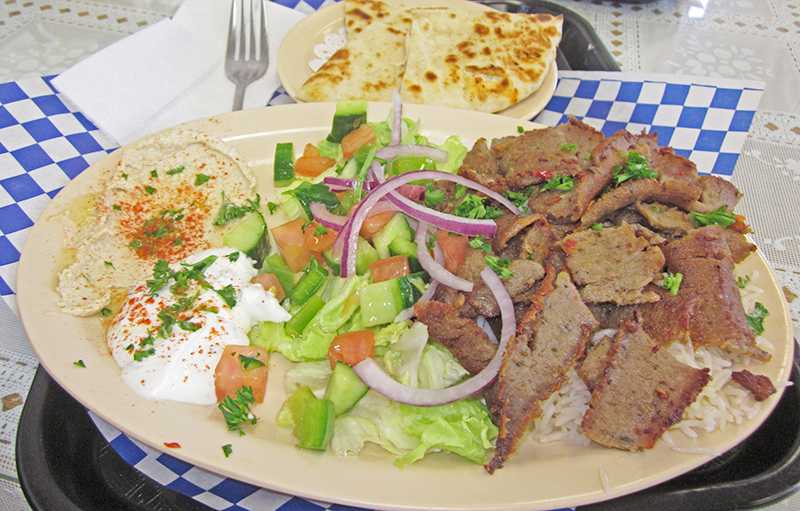 Kabob and Gyro Grill, located on Laguna Blvd, serves a lamb platter consisting of thinly marinated slices of lamb over basmati rice, and served with a side of salad, hummus, tzatziki (cucumber sauce) and a hot piece of pita bread on Oct 24.