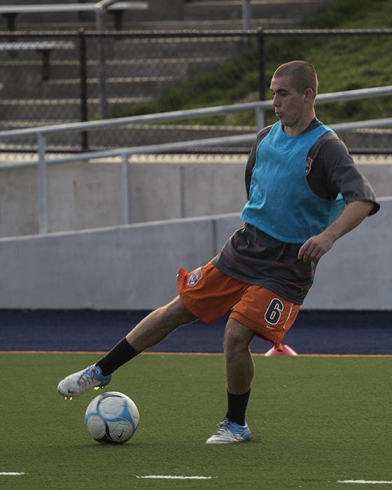 Freshmn midfielder Ander Saez dribbles the ball during a drill in team practice on Nov. 12. 