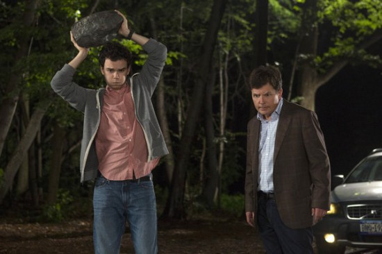 Michael Henry (Michael J. Fox, Right) and his son Ian (Conor Romero) have a father and son moment over what to do with a deer they hit during the episode Homecoming.