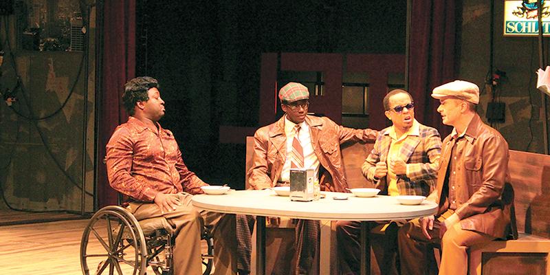 (From left to right) Al, Gene, Jonesy and Ziggy share a meal at Melody Lounge during dress rehearsal for the production of Sideman on Nov. 7.