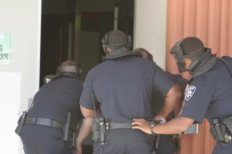 Cosumnes River College police officers breach the Community Activity Center in order to take down the active shooter during a training session in May 2010.