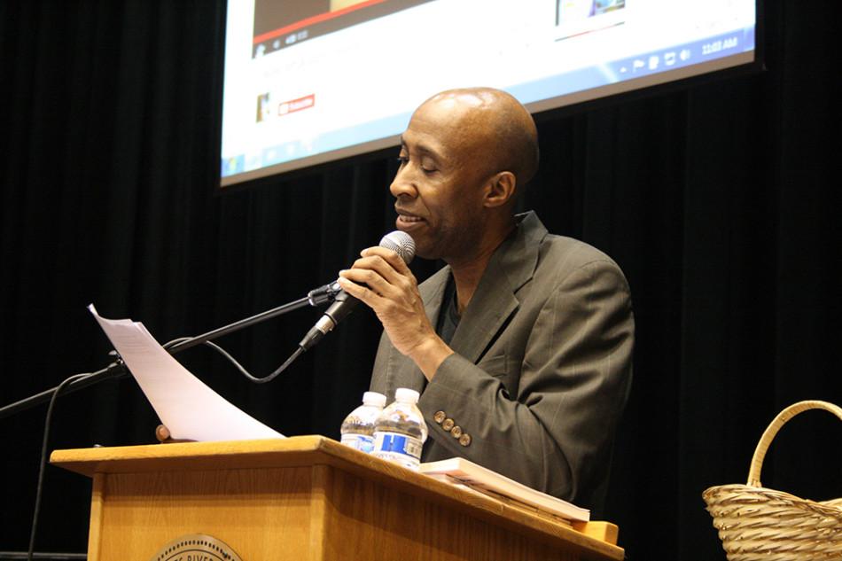 Poetic performer M.e. Miller smiles as students react to a part of the original poem he recited. Miller was one of three poetic performers that came to celebrate Black History Month at the Poetic Voices event at Cosumnes River College on Feb. 19.