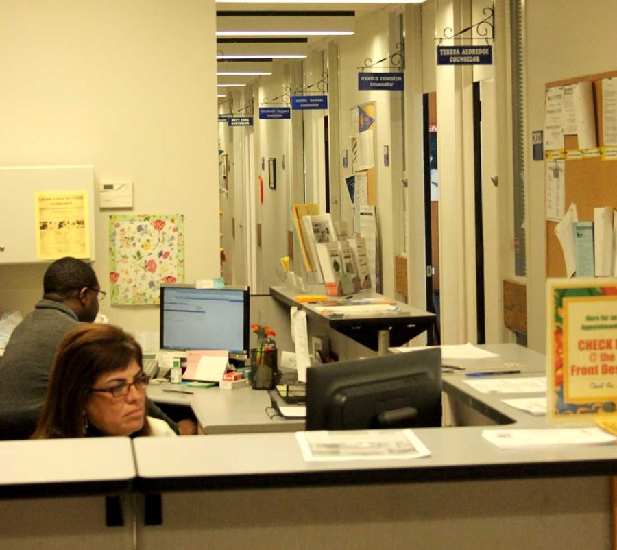 Selena Martinez, a member of the CRC counseling department works on her computer in the counseling office on March 10. Students at California State Universities would have to pay additional fees for similar services.