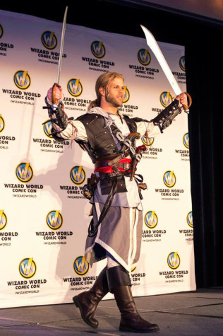 Dressed as Edward Kenway from the popular video game series "Assassin's Creed," Ryan Frye, a veteran cosplayer, prepares to judge costume contest of the first annual Wizard World Comic Con Sacramento on March 8.