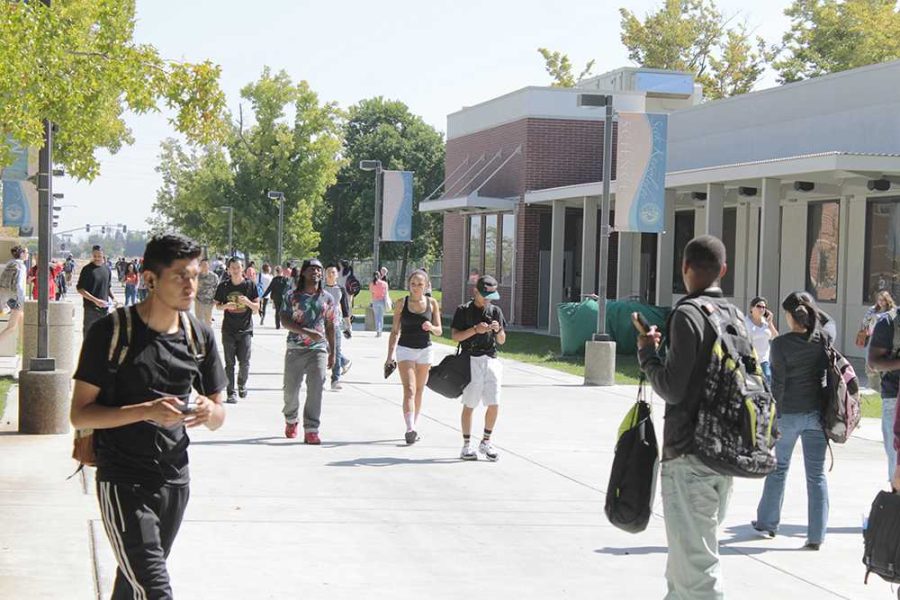 Students coming and going from the Bruceville side of campus, displaying CRC's diverse student body.