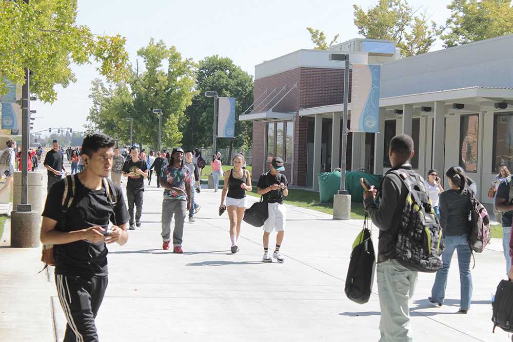 Students coming and going from the Bruceville side of campus, displaying CRC's diverse student body.