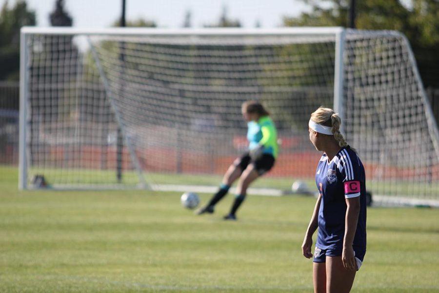 Sophomore defender Kori Martin catches her breath as goalkeeper Anna Brown keeps Evergreen Valley College from scoring once more.