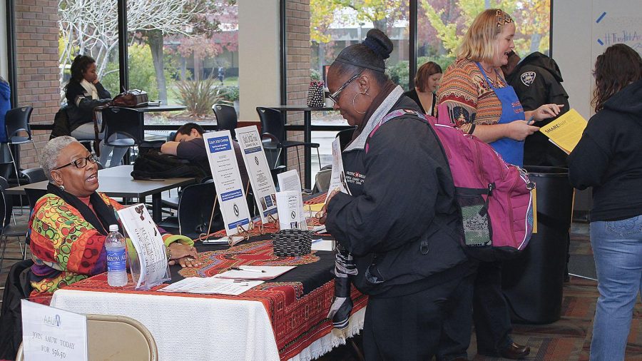SHAREfairs vendors took over the cafeteria on Nov. 19 to talk to students and receive donations.