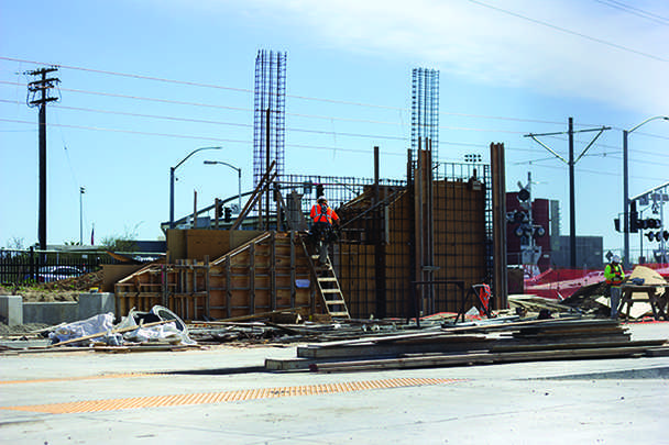 Construction continues on the Blue Line lightrail near CRC's east entrance. Students can expect to see the finished product by September.