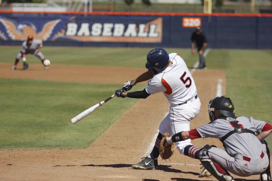 Freshman+outfielder+Robert+Daugherty+playing+at+the+Hawks+home+game+against+Sacramento+City+College+on+April+16.