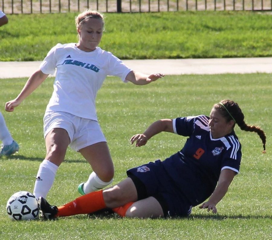 Defender Jessica DeAnda goes for the tackle on the ball and defends the goal from the Folsom Lake Falcons on Sept. 2.