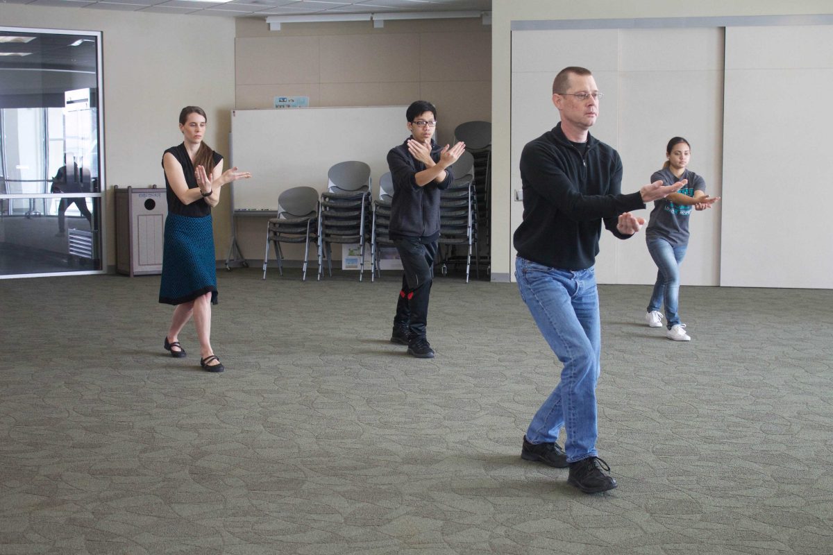 Philosophy professor Rick Schubert guides students and faculty through a 50 minute tai chi session on March 2.