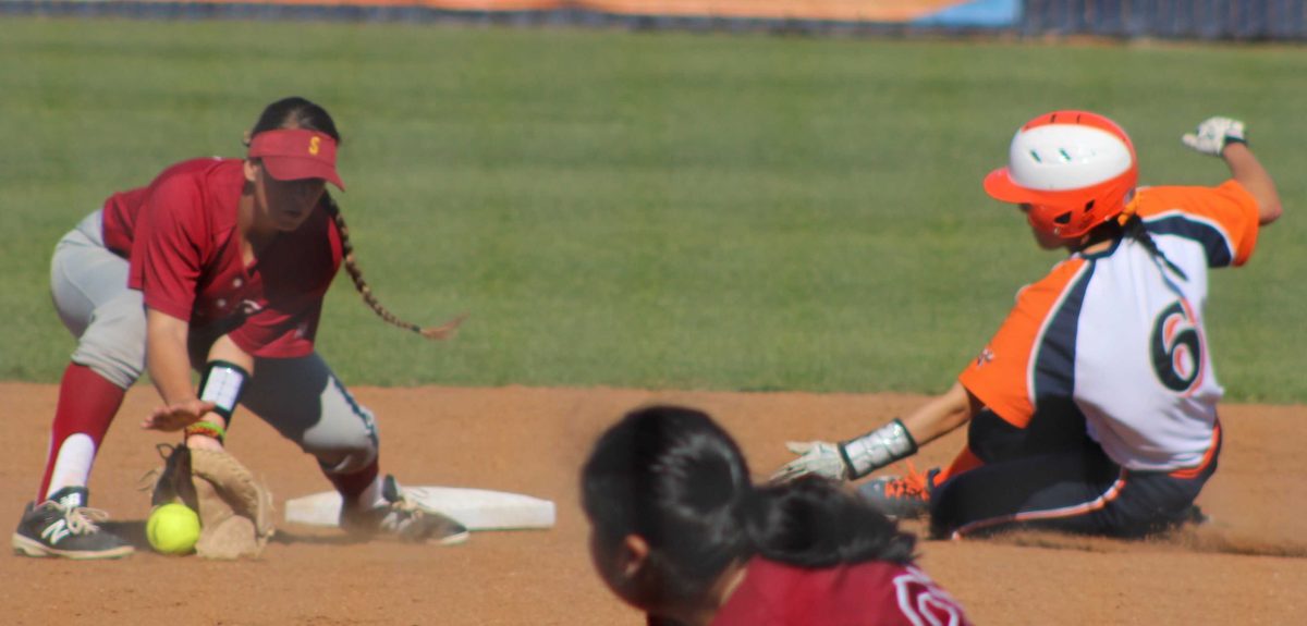 Sophomore shortstop Brenda Velasquez slides in to second base against Sacramento City College on March 22