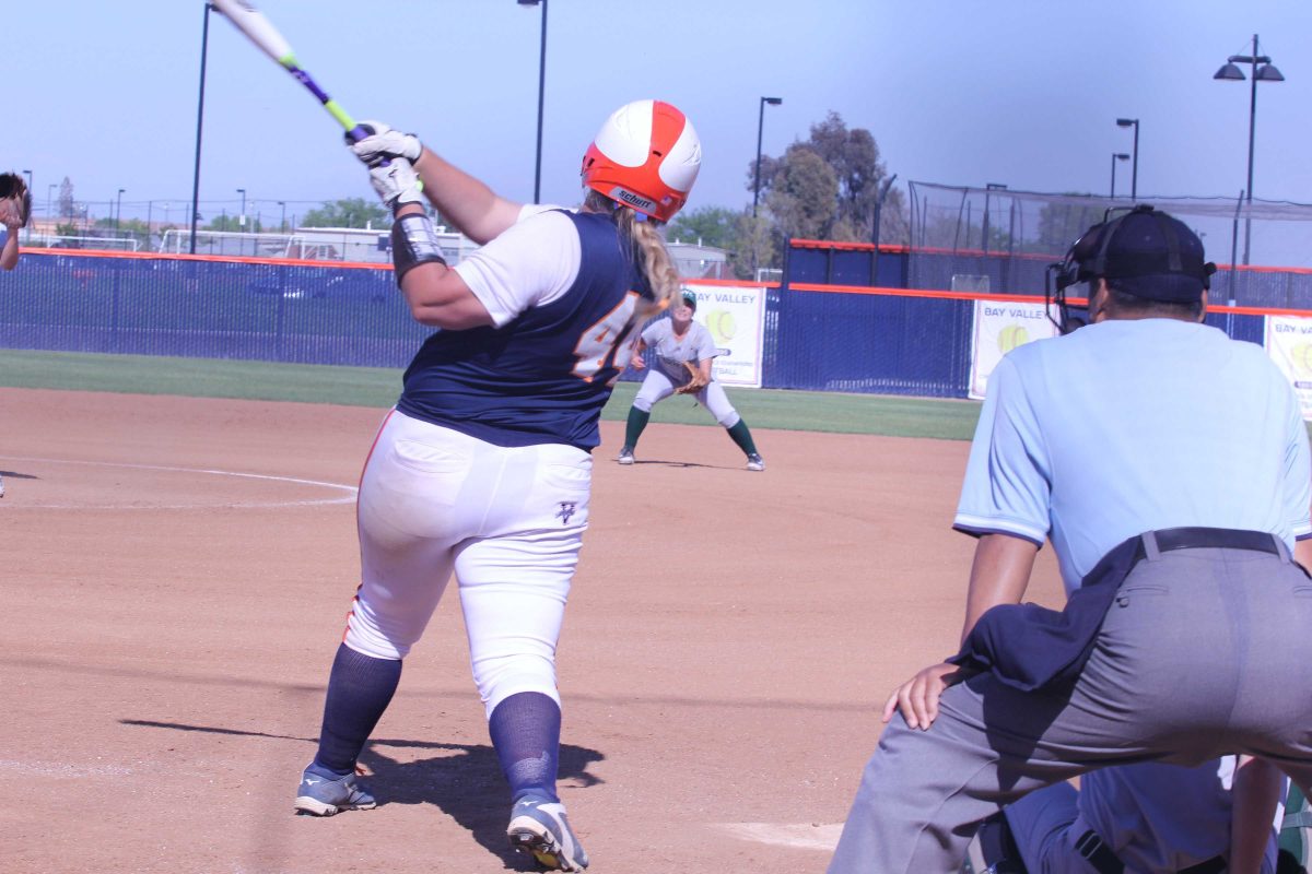 Sophomore first baseman Rachel Hooper hits a walk-off single into center field.