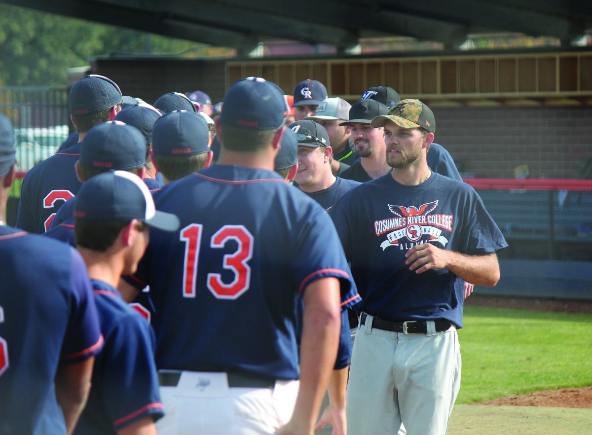 Cosumnes+River+College+baseball+alumni+and+current+players+shake+hands+after+the+2016-2017+team+won+the+annual+alumni+game+2-0+on+Nov.+5.+