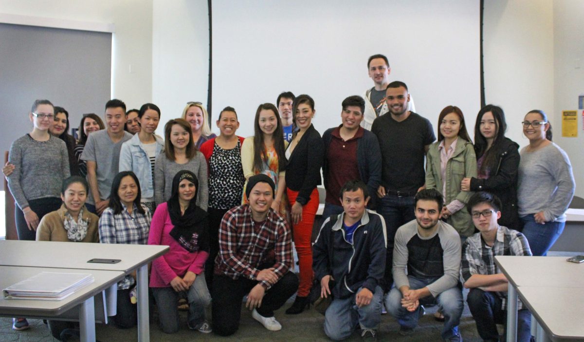 Professor Trang Abeid with her English as a second language students after speeches were given. 