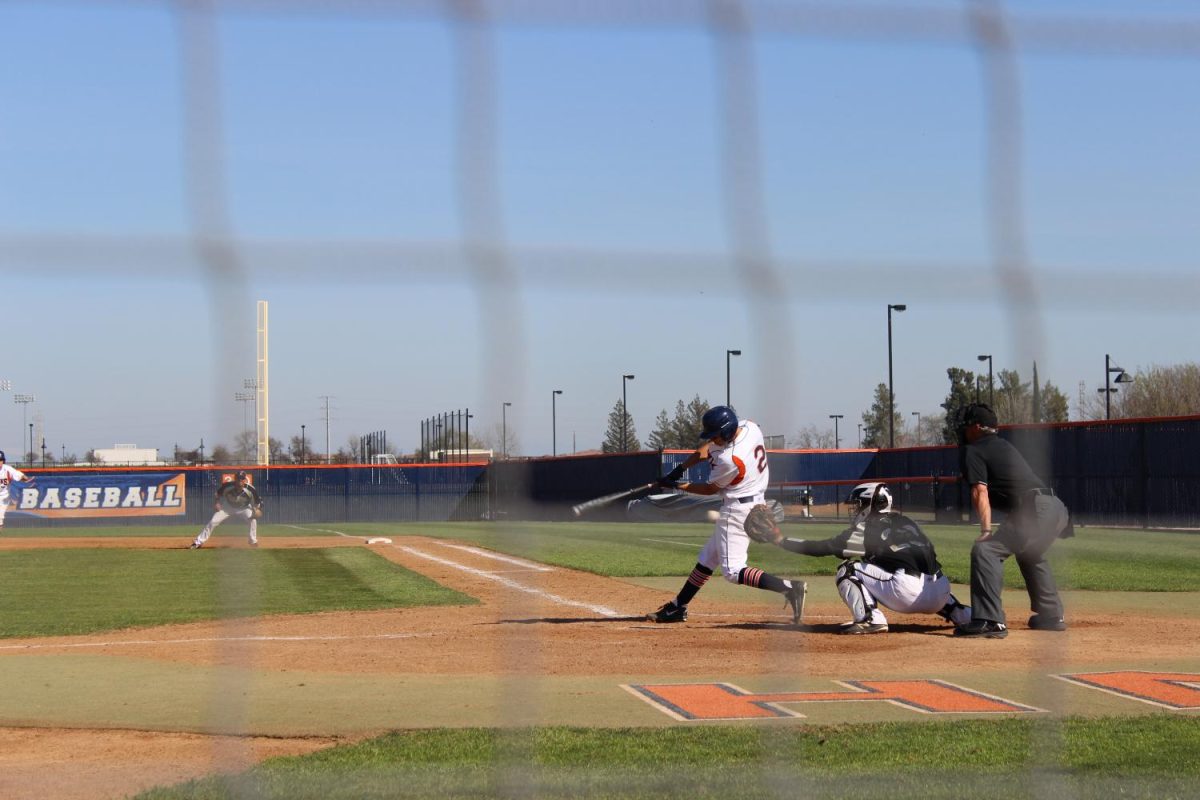 Sophomore shortstop Brett Bloomfield strikes out in the bottom of the third inning, leaving the Hawks at 9-1.