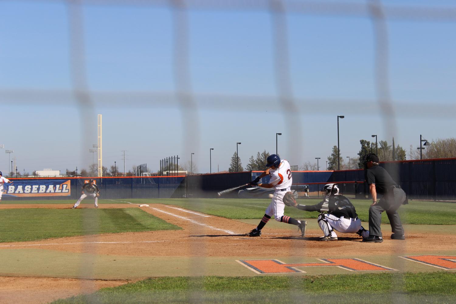 Sophomore shortstop Brett Bloomfield strikes out in the bottom of the third inning, leaving the Hawks at 9-1.
