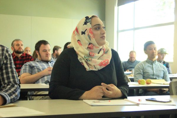 Student Body President Halimeh Edais discusses the proposal of a meditation room for students during an Academic Senate meeting on Friday.
