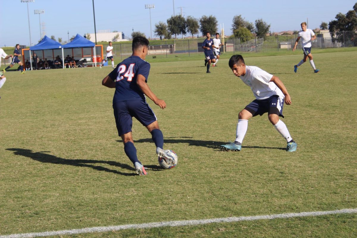 Freshman forward Francisco Comparan faces off one-on-one in Fridays game versus Clovis.