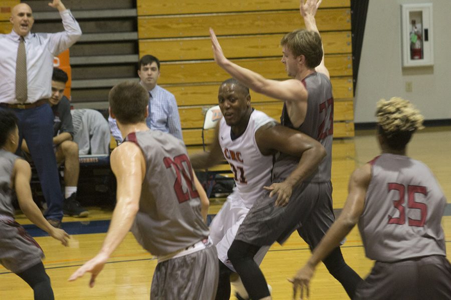 Forward Nathan Wilson trying to score in the paint in a loss to Sierra