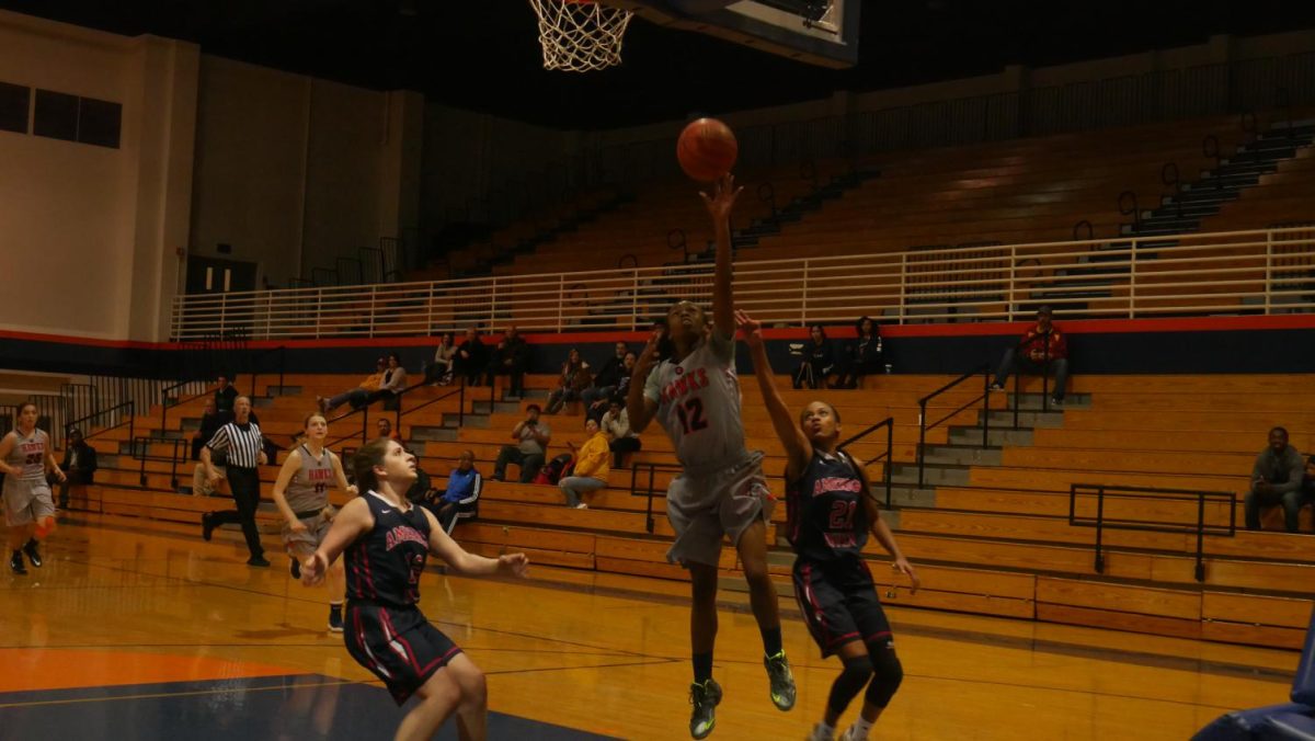 Guard Alexiza Liddell going up for a lay-up against ARC