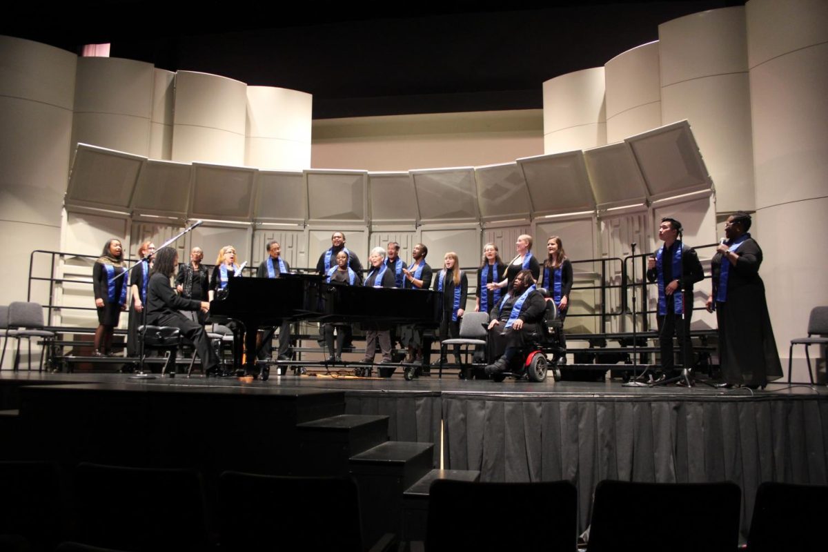 Gospel choir sings "Oh Happy Day" alongside  soloists Felicia Bissent and Tin Bui.