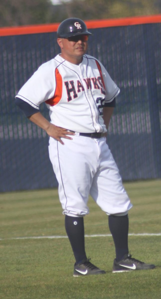 Don Mico looks on as Hawks play Lassen Community College on Feb.9