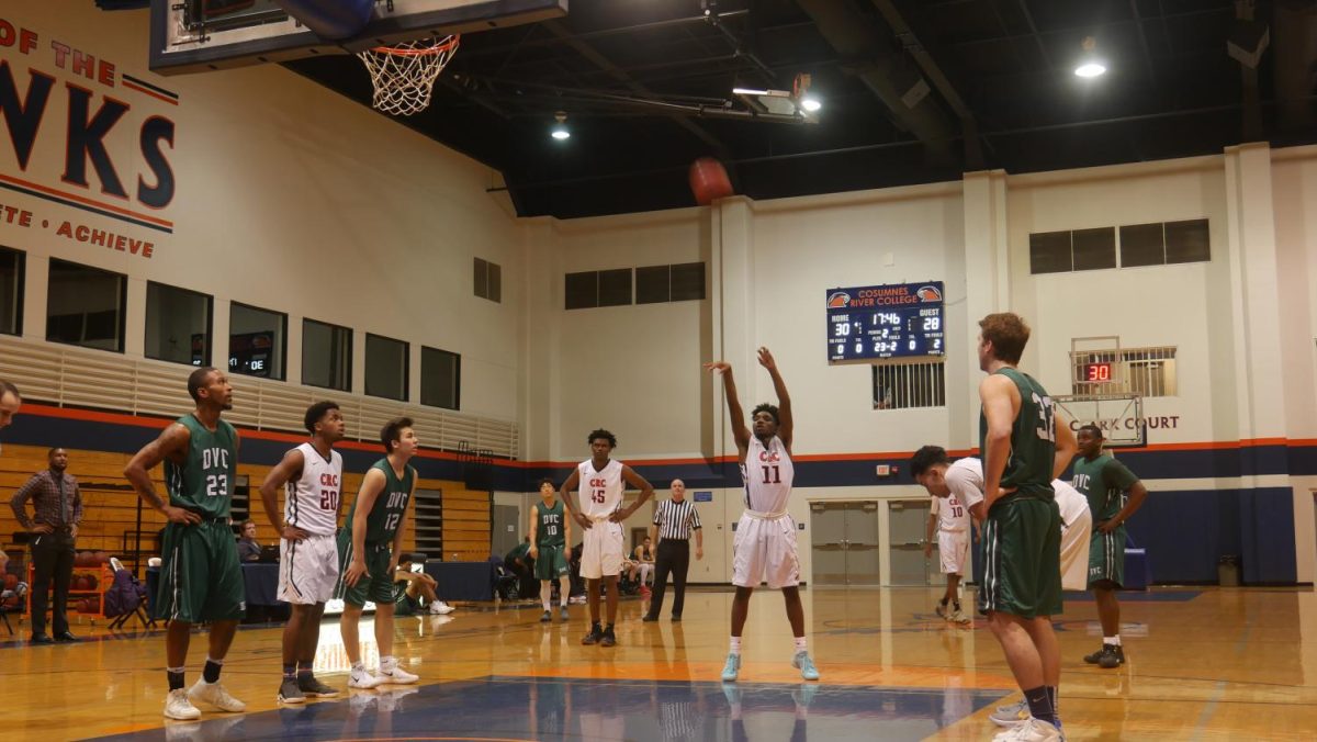 Guard De Rajaee Austin shooting free throws in a loss to DVC