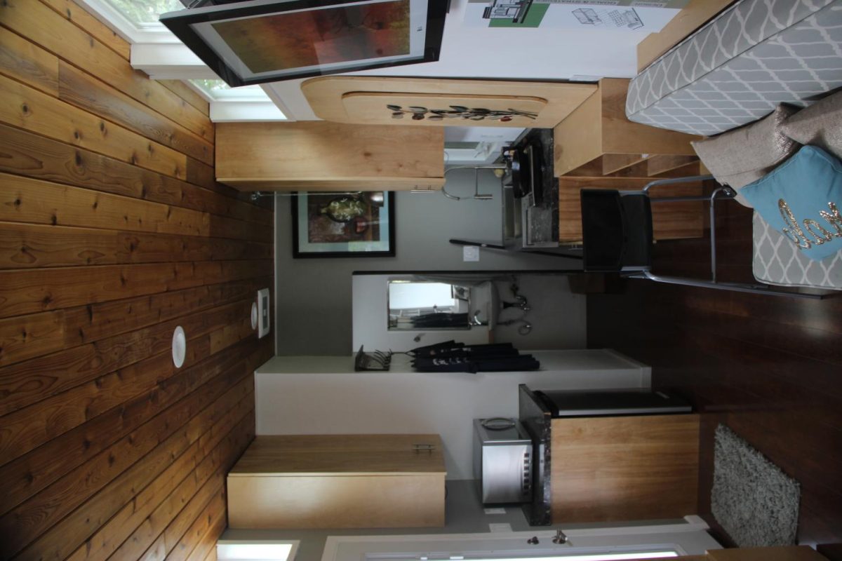 Interior of the tiny house. The tiny house was build to be zero net energy, complete with radiant heat, solar panels and compostable waste toilet system.