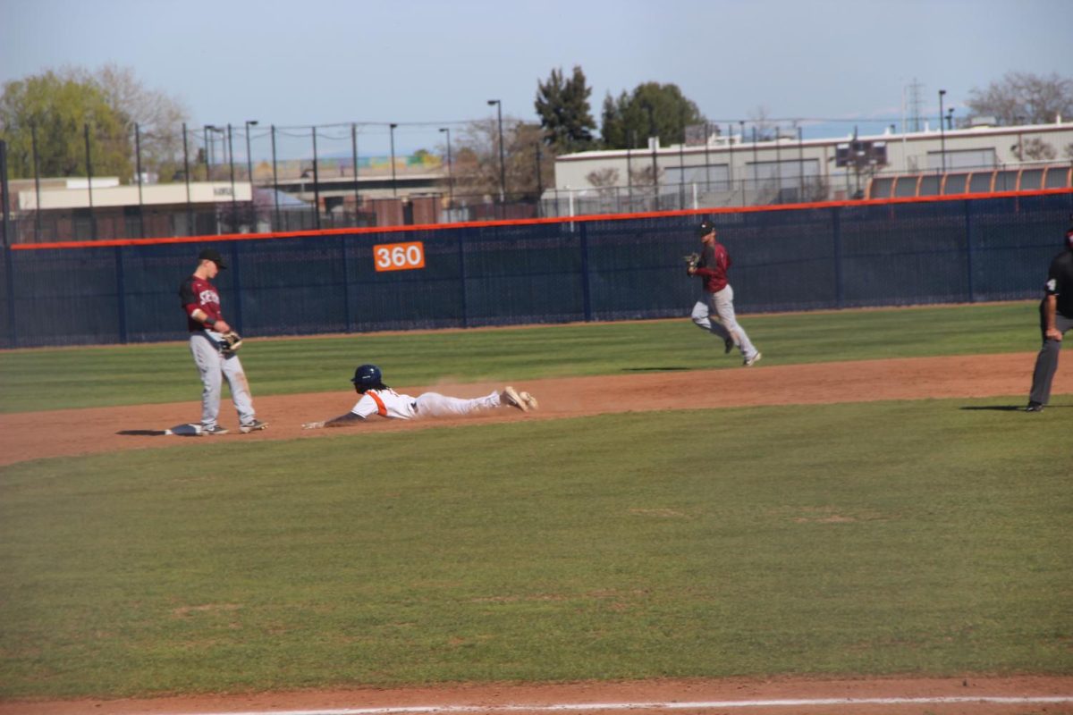 Freshman+infielder+Essex+Brown+stole+second+and+later+scored+in+the+5th+inning+on+Thursday.+The+Hawks+struggled+against+the+Wolverines+powerful+offense%2C+giving+up+39+runs+in+the+three+game+series%2C+including+14+on+Thursday.