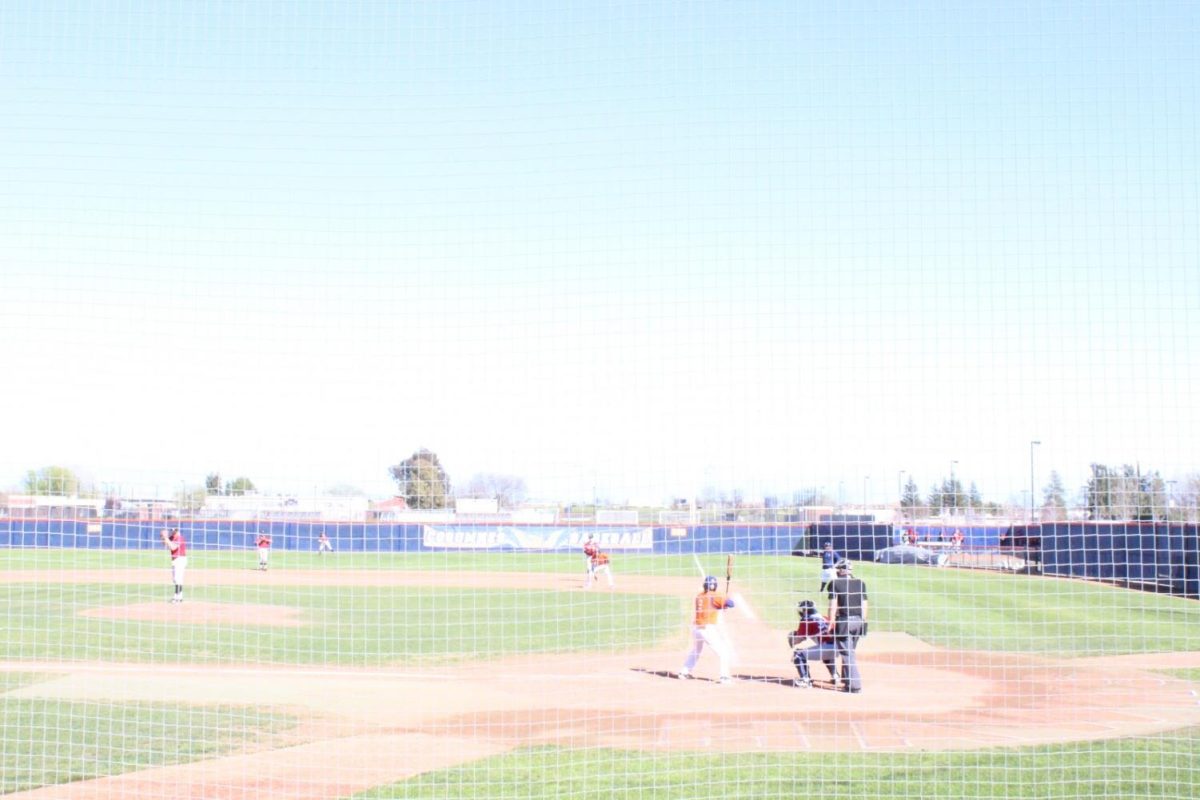 Infielder Ryan Barry at bat against the Tigers during their 9-3 win. The Hawks offense came alive scoring 20 combined runs during their double header against the Tigers on March 21.