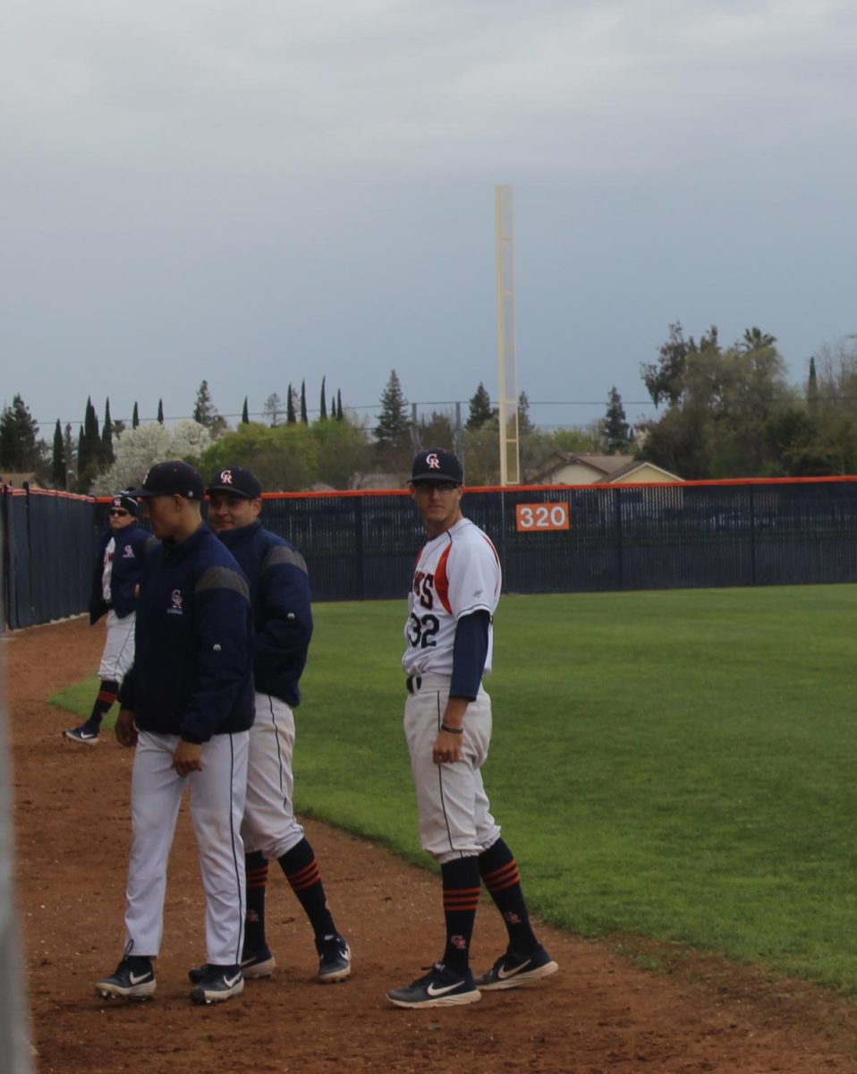 Sophomore pitcher Josh Caldwell looks towards The Diablo Valley Vikings dugout before his start on Thursday. Caldwell pitched six innings allowing two earned runs on four hits, earning the win for the Hawks.