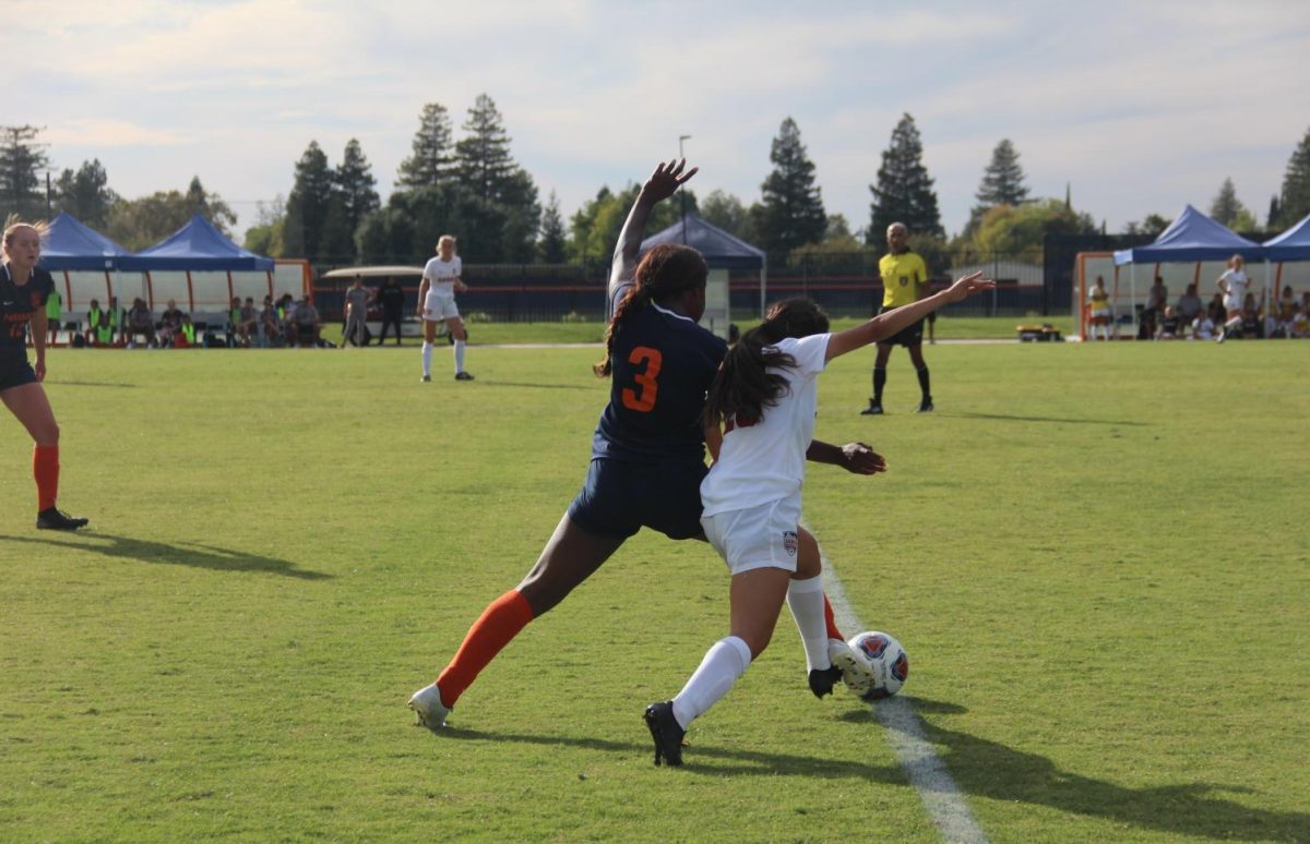Sophomore right forward Obioma Onejeme number three steals the ball from the Sierra College defender. Onejeme, who started in eleven games, has scored five goals, one being a game-winning goal.